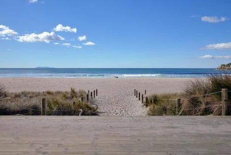 Beach. The Atrium Apartments
