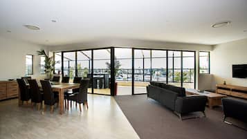 Penthouse, 4 Bedrooms | Living area | Flat-screen TV