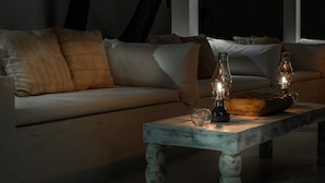 A cozy living room with a sofa and a coffee table. - W15 Escape (Ahangama)