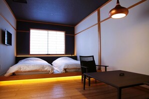 Twin Room | Down comforters, in-room safe, individually decorated, free WiFi