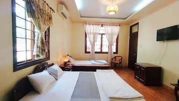Superior Quadruple Room | Individually furnished, desk, laptop workspace, blackout drapes