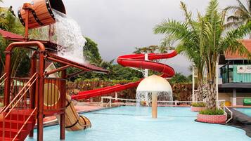 Outdoor pool, open 8:00 AM to 5:00 PM, pool loungers