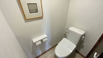 Family Cabin | Bathroom | Separate tub and shower, slippers, towels