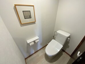 Family Cabin | Bathroom | Separate tub and shower, slippers, towels