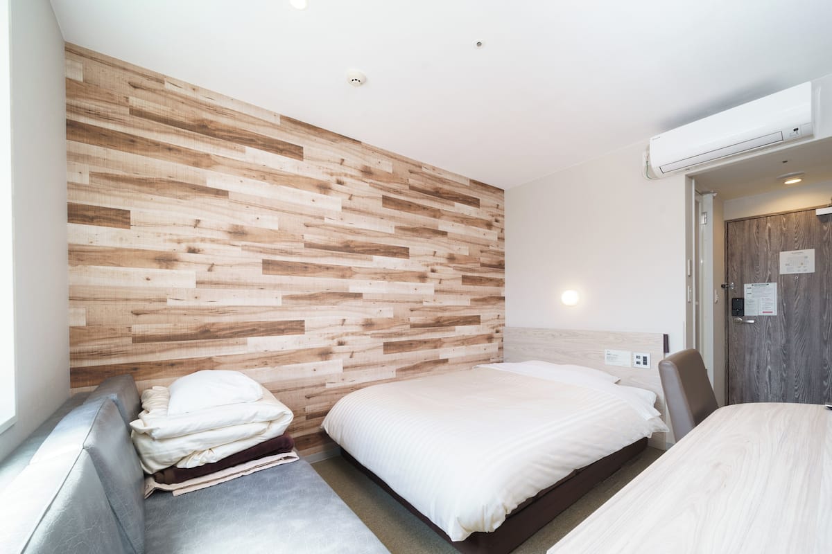 Double Bed with Sofa, Non Smoking (No housekeeping) | Minibar, free WiFi, bed sheets