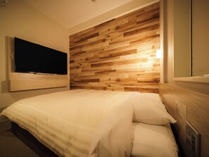 Minibar, gratis wi-fi och sängkläder