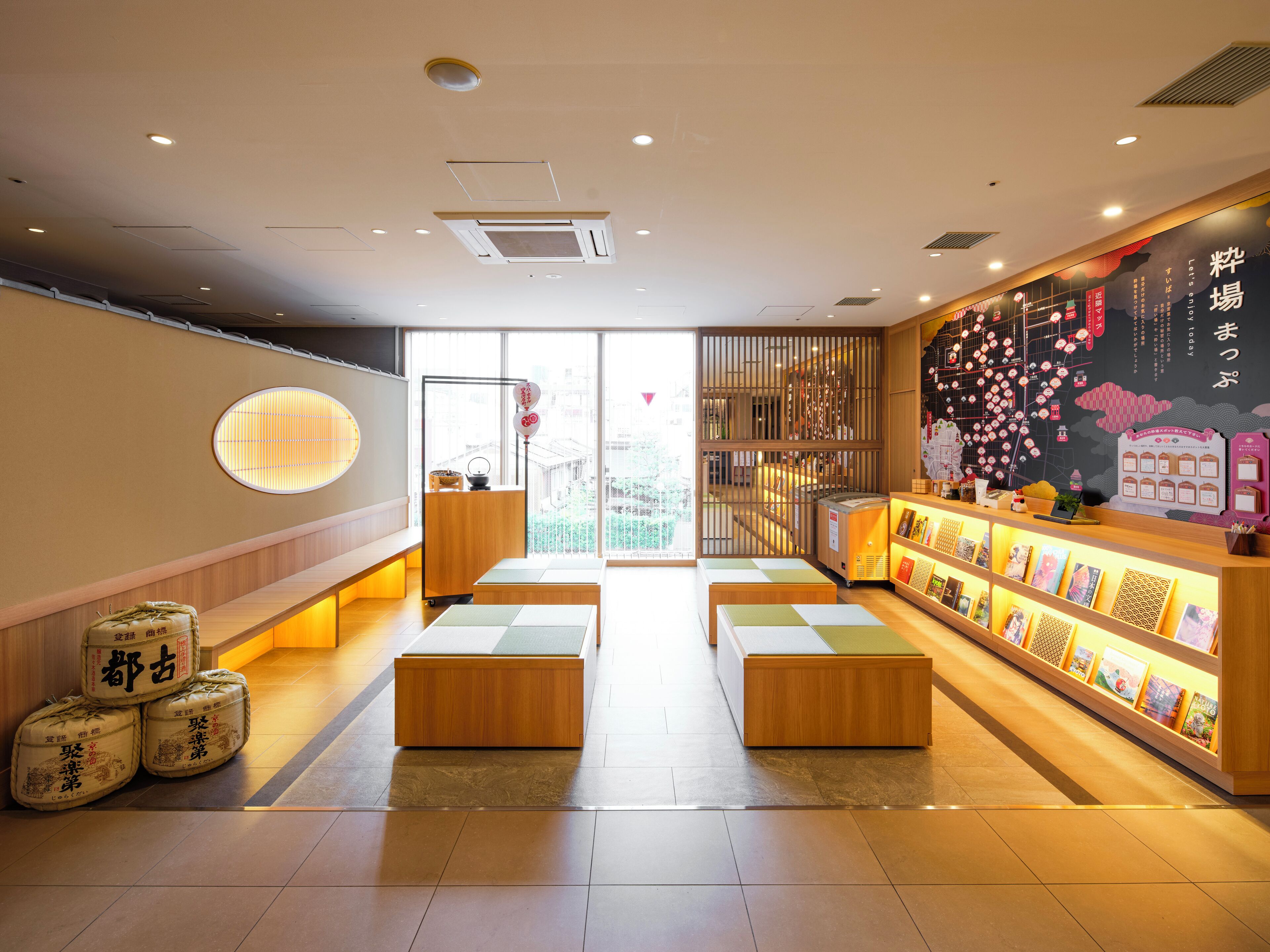 A modern interior with wooden furniture, a reception desk, and a wall displaying various items.