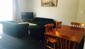 Suite, 3 Bedrooms | Living area