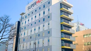 A multi-story hotel building with a prominent 'Super Hotel' sign on the top. - SUPER HOTEL Kushiro Kurogane (Kushiro)
