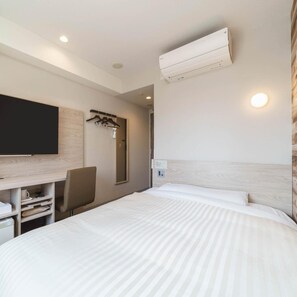 Een bureau, geluiddichte muren, gratis wifi, beddengoed