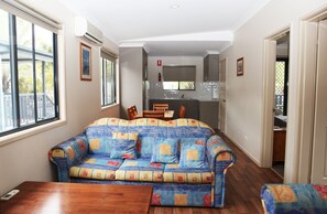 Family Villa | Living area | Flat-screen TV