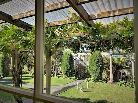 Waimarino Two-Bedroom Suite | Premium bedding, individually decorated, laptop workspace