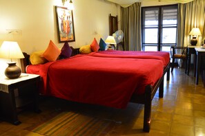 Luxury Cottage, 1 Bedroom | Minibar, desk, soundproofing, iron/ironing board - Red Earth Kabini (Heggadadevankote)
