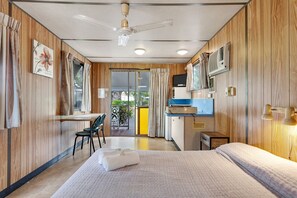 Double Bungalow with Private Bathroom | Living area | Flat-screen TV - First City Caravilla (Earlville)