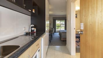 Quarto executivo | Cozinha privada | Geladeira, micro-ondas