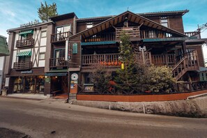 A multi-story building with a restaurant on the ground floor, a bar, and a visible staircase leading to the upper floors. - Hotel Morgenrot (Kobe)