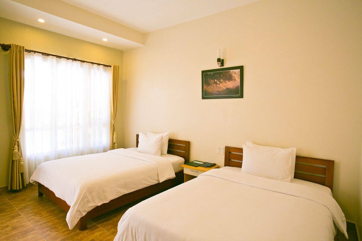 Quarto duplo standard | Escrivaninha, cortinas blackout, Wi-Fi de cortesia