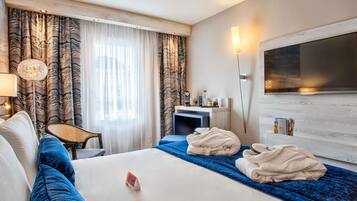 Colchones con pillow-top y minibar con artículos gratuitos