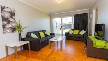 Family Double Room, 2 Bedrooms | Living area | Flat-screen TV