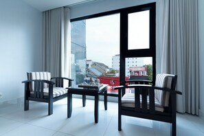 Deluxe Room, City View | Premium bedding, minibar, in-room safe, desk