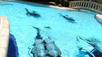 Relax by the serene pool, complete with a floating pool toy.