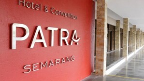 A hotel entrance with 'Hotel & Convention' and 'PATRIA SEMARANG' signage. - Patra Semarang Convention (SEMARANG)