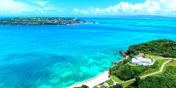 Private beach, white sand, beach umbrellas, beach towels