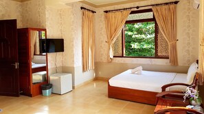 Quadruple Room | Mini-refrigerator - Delight Hotel (Phan Thiet)