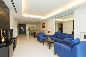 Family Apartment | Living area | 32-inch TV with satellite channels - The Palms Kamala Beach (Kamala)