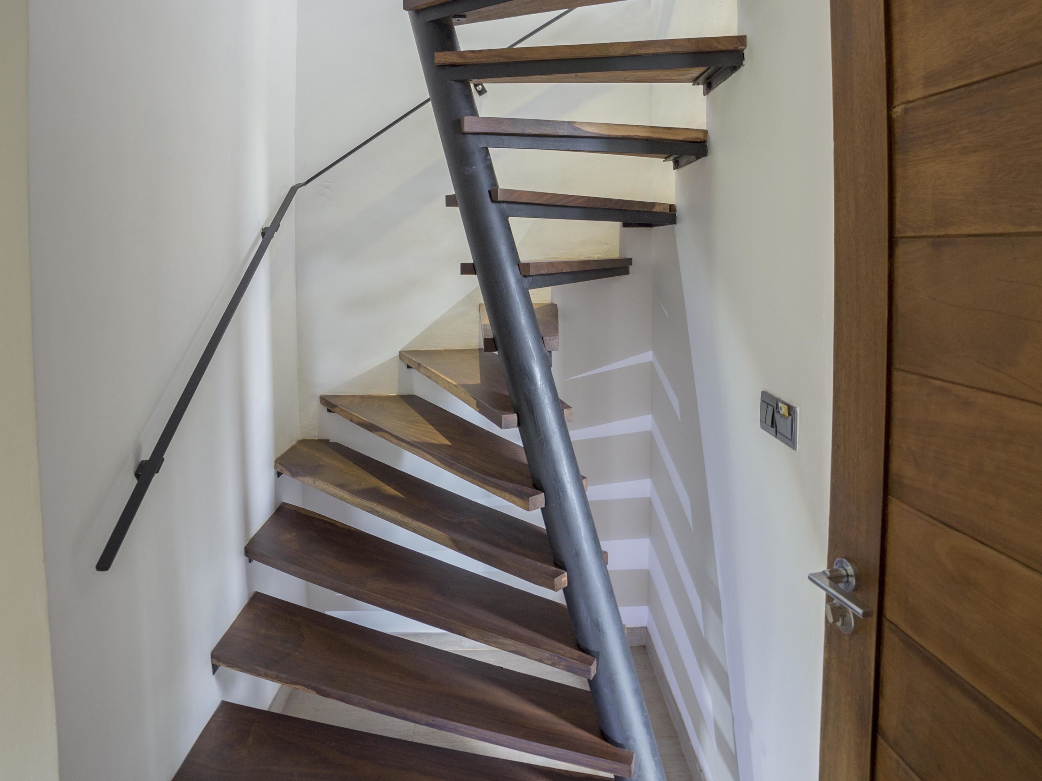 deluxe family room with free benefits | staircase