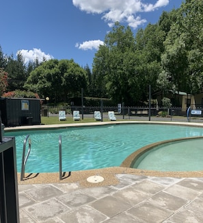 Outdoor pool, open 9 AM to 8 PM, pool umbrellas, sun loungers