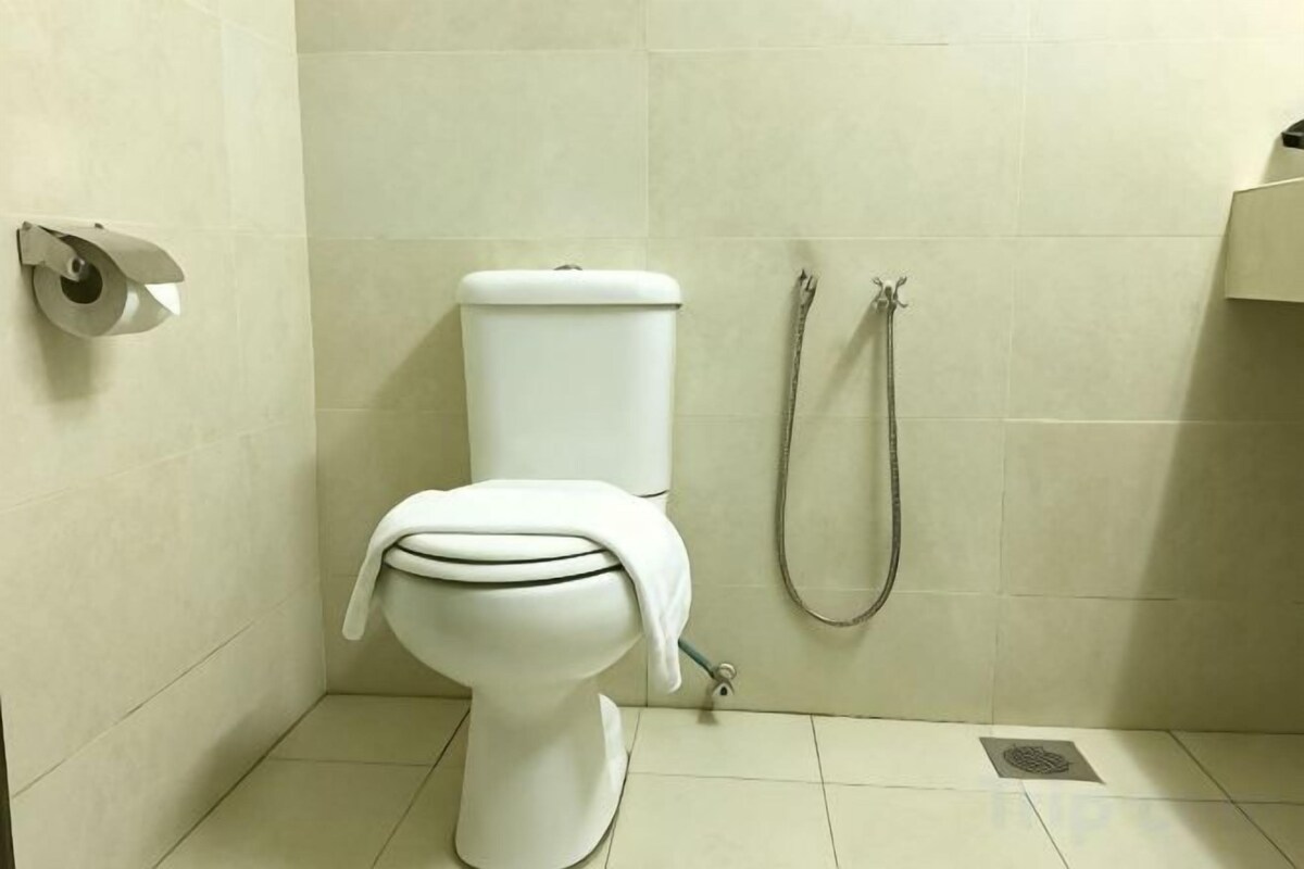 Baño | Artículos de higiene personal gratuitos, secador de pelo y toallas