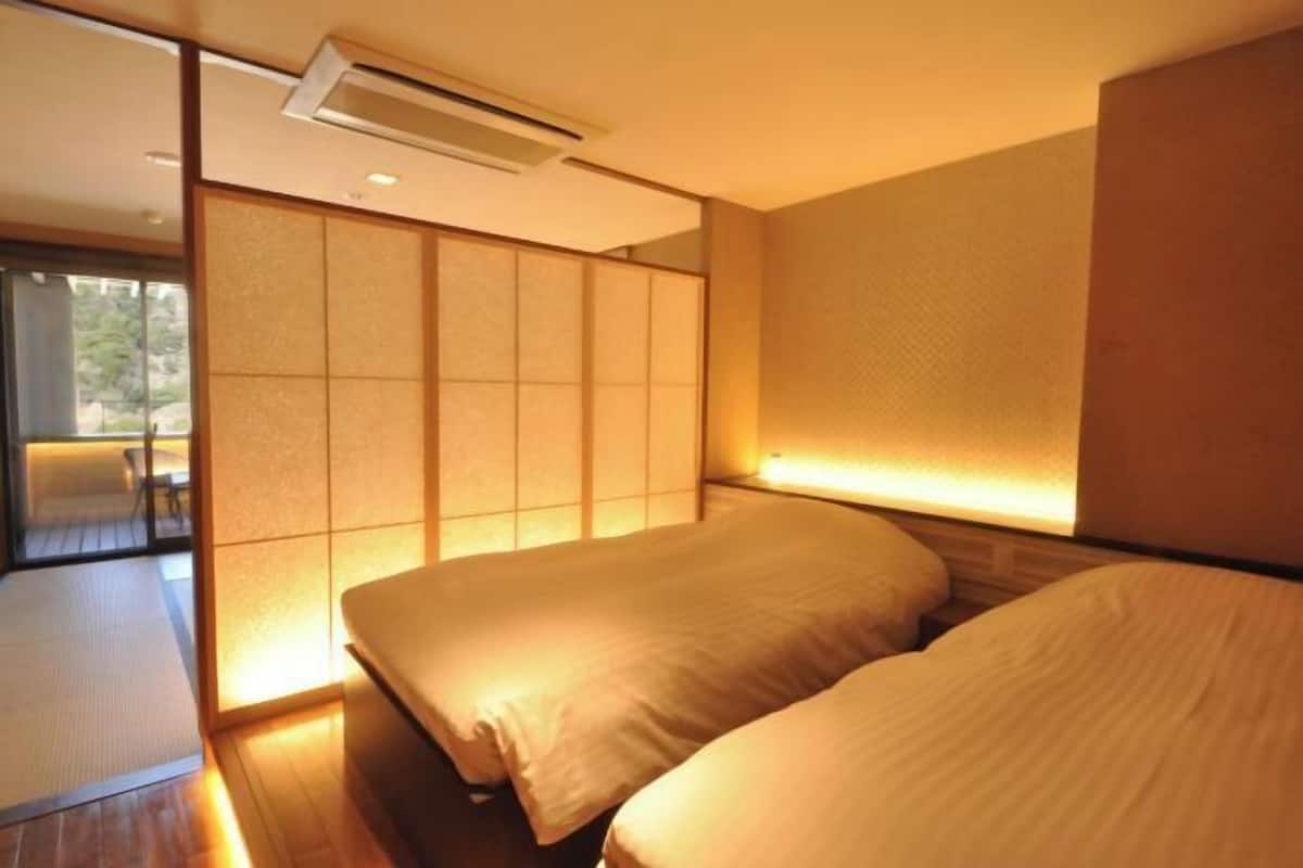 客房内保险箱、隔音、免费 WiFi、床单