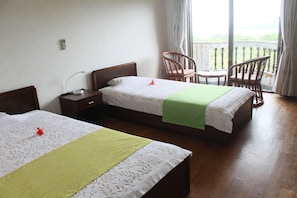 Chambre avec lits jumeaux, vue océan (with Shared Bathroom)