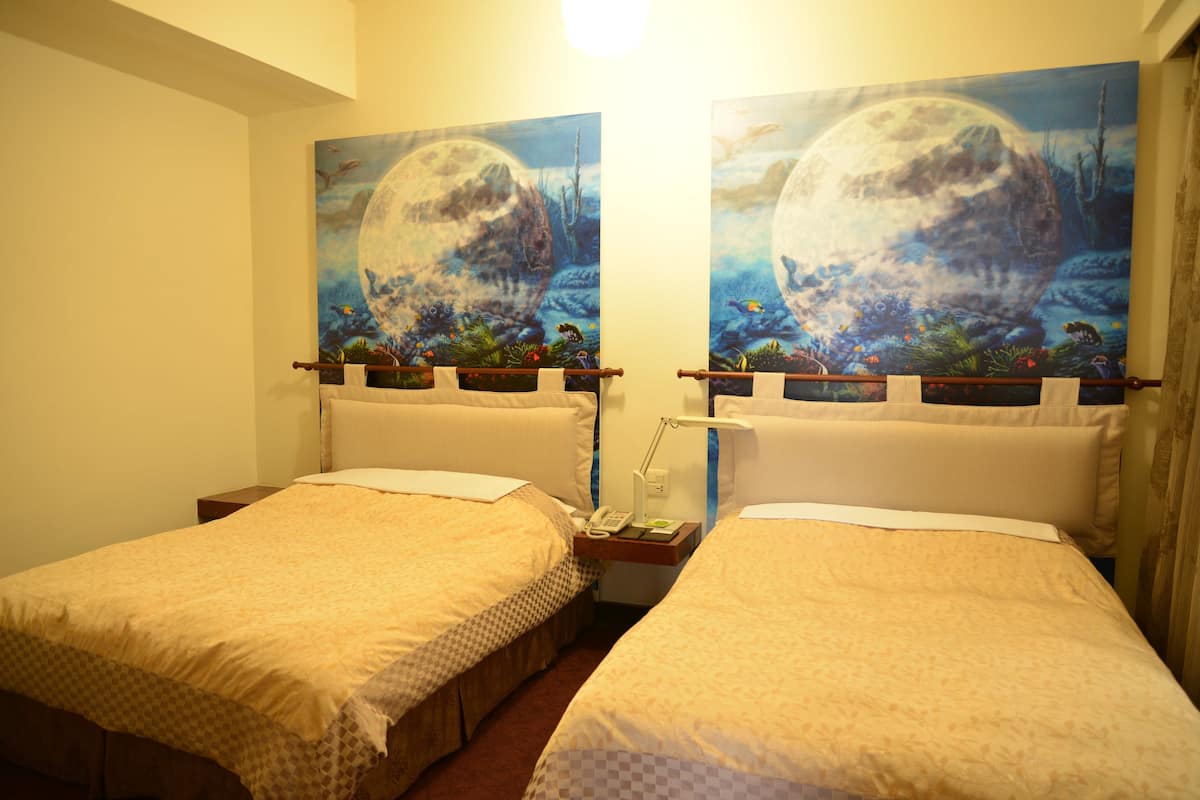 Quadruple Room | In-room safe, desk, blackout curtains