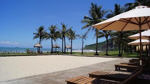 Private beach, white sand, sun-loungers, beach umbrellas