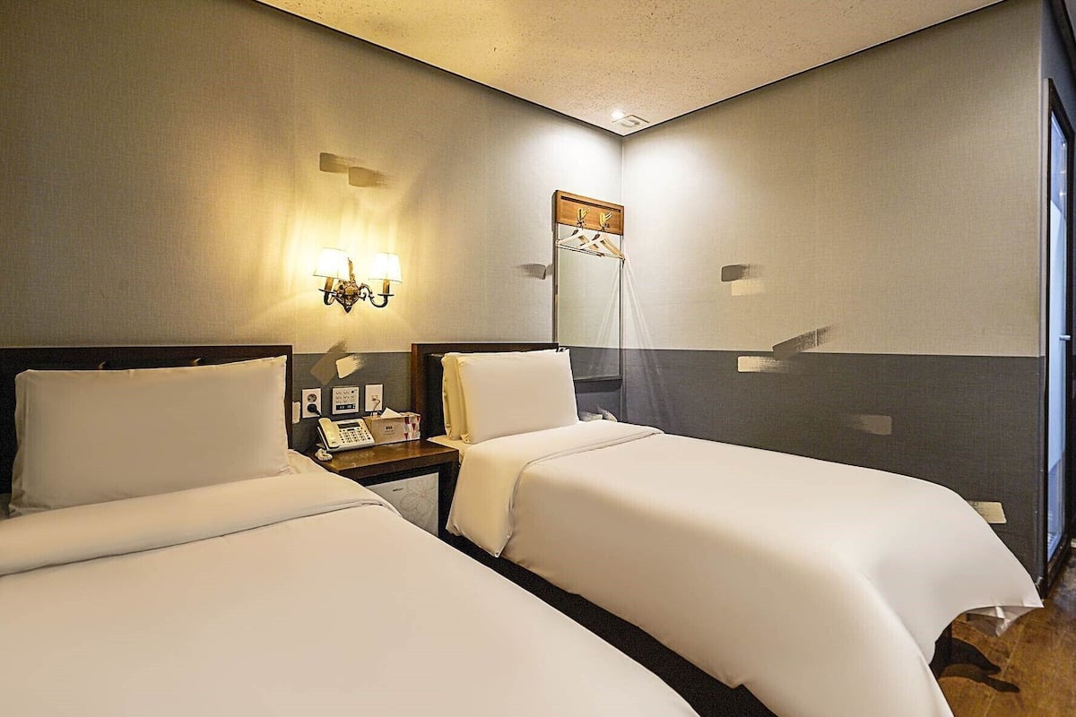 Premium bedding, pillow-top beds, free minibar, in-room safe