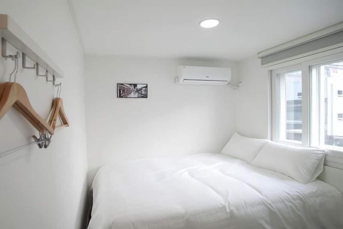 Blackout curtains, soundproofing, free WiFi, bed sheets