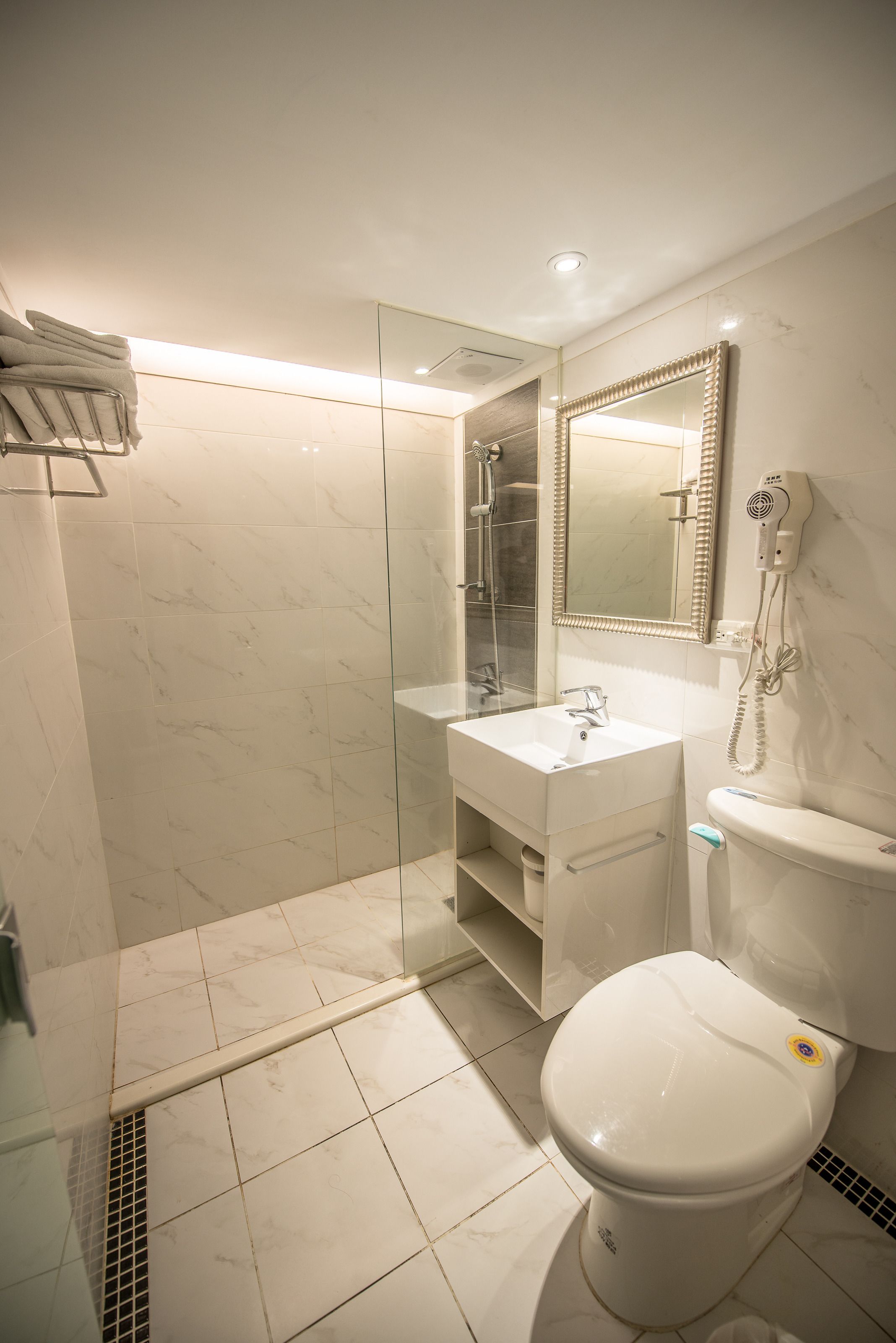 free toiletries, hair dryer, slippers, towels