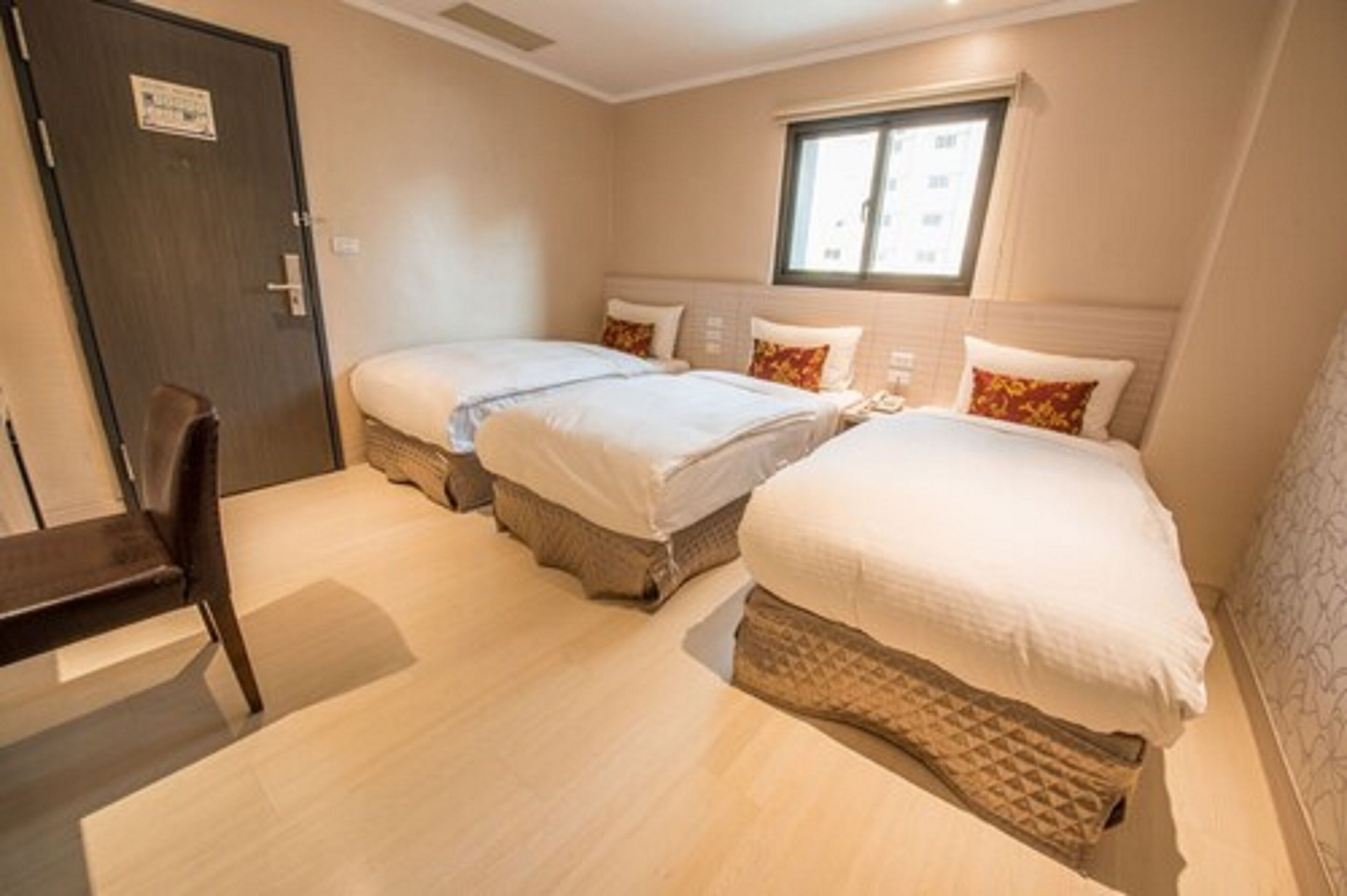 city triple room, 3 single beds | down duvets, desk, iron/ironing board, free wifi