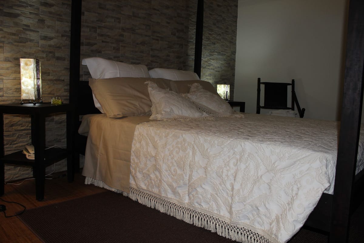 Panoramic Suite, 1 Bedroom, Private Bathroom, Hill View | Premium bedding, down duvets, memory-foam beds, minibar