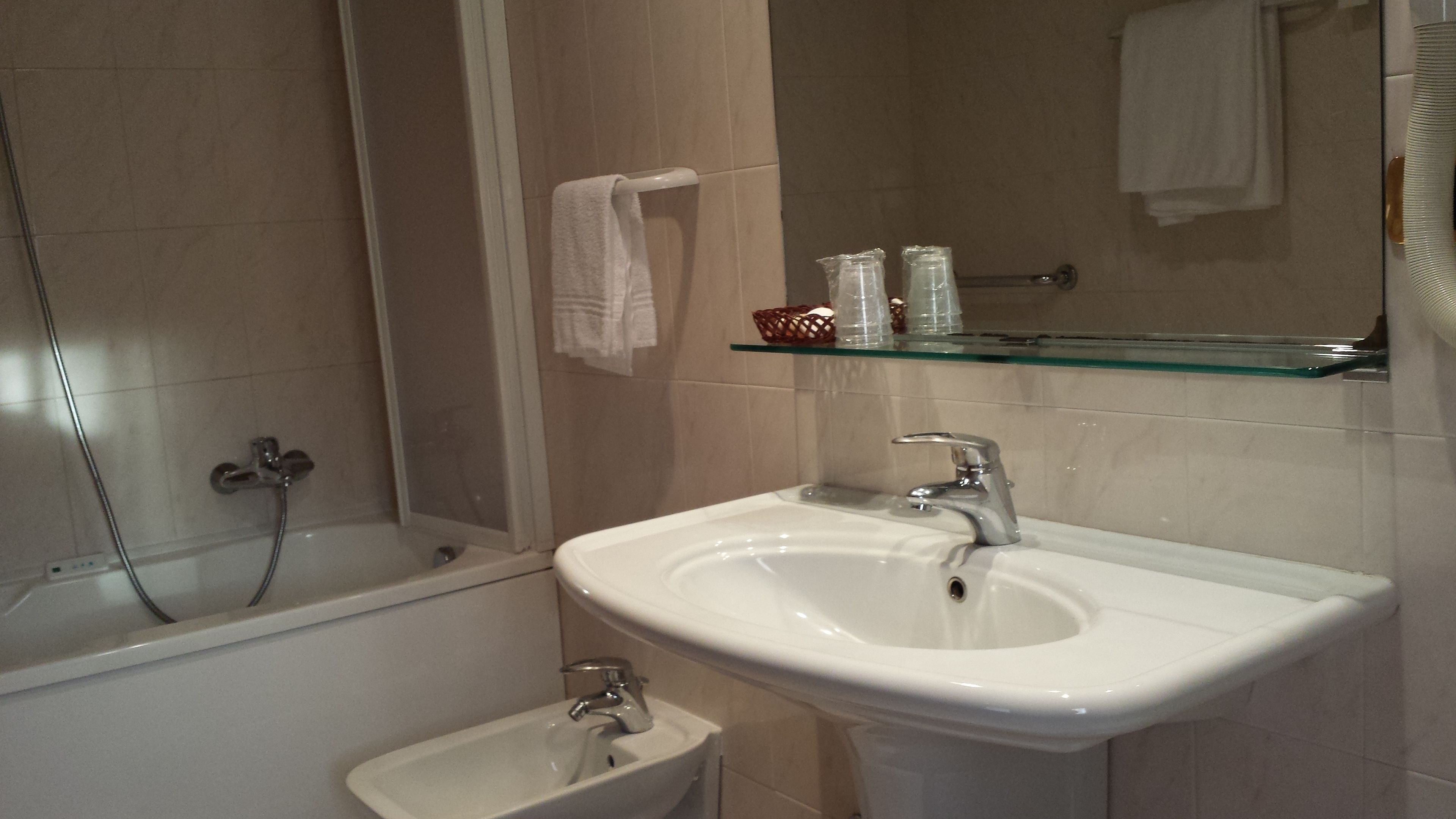 free toiletries, hair dryer, bidet, towels