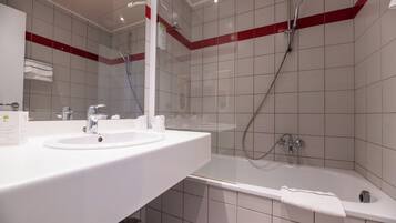 Combined shower/tub, hair dryer, towels, soap