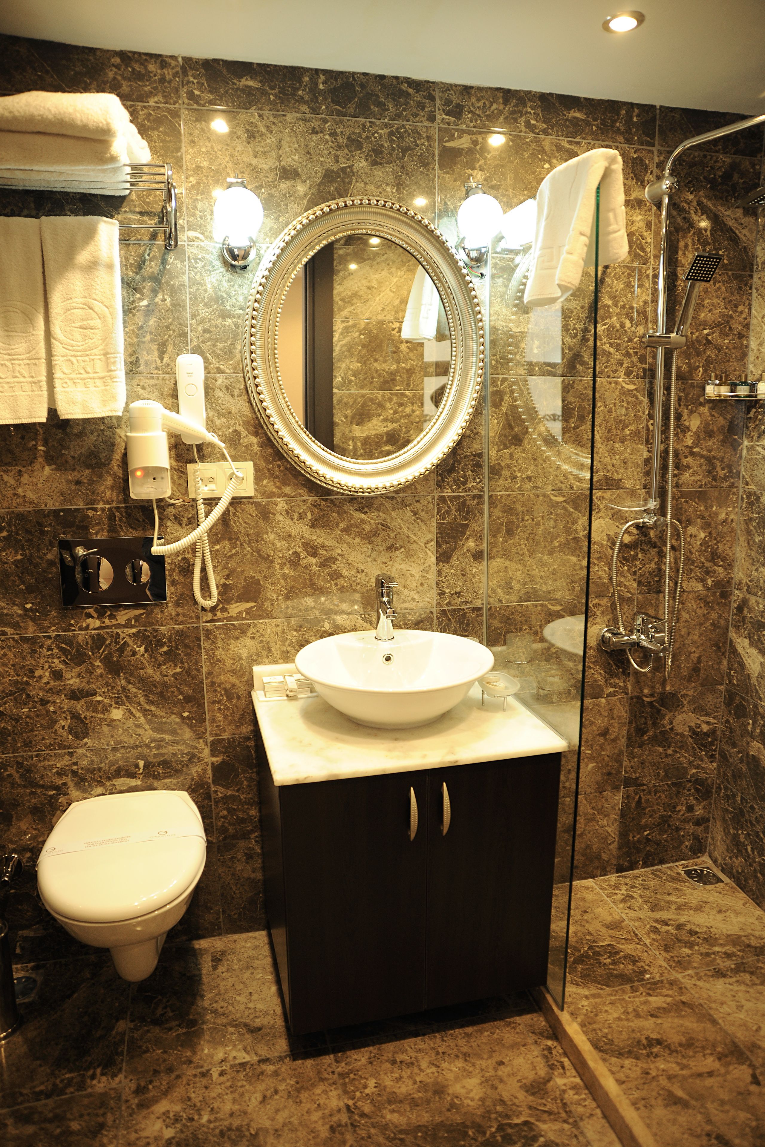 Shower, free toiletries, hair dryer, towels