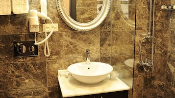 Shower, free toiletries, hair dryer, towels