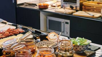 Daily buffet breakfast (EUR 12 per person)