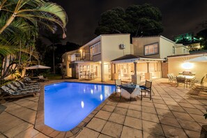 Outdoor pool, pool umbrellas, sun loungers