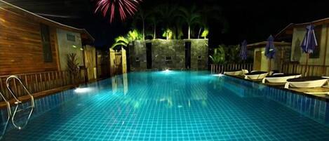 Outdoor pool, pool umbrellas, sun loungers