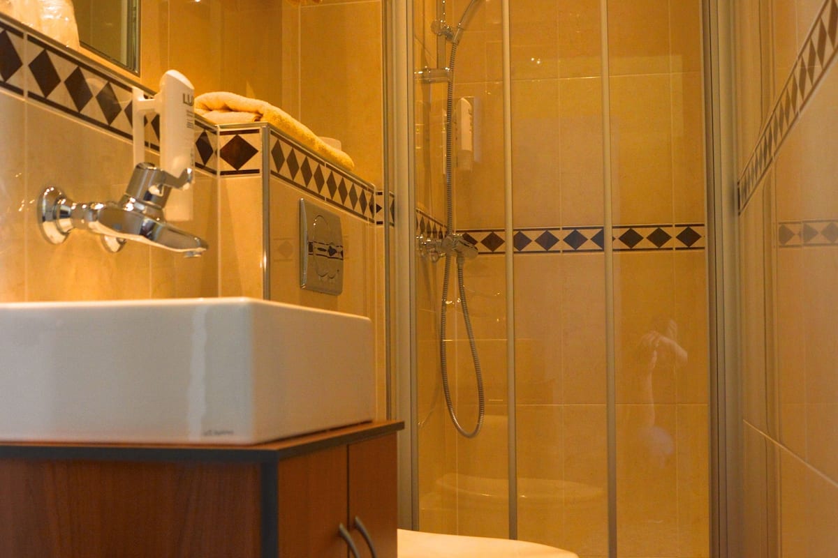 comfort double room | bathroom | hair dryer, towels