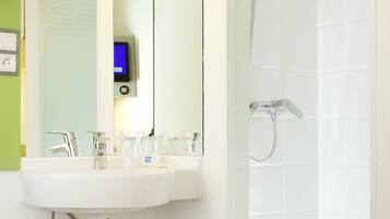 Shower, rainfall showerhead, hair dryer, towels